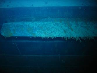 Concealment flap for above-water torpedo tubes on stbd side